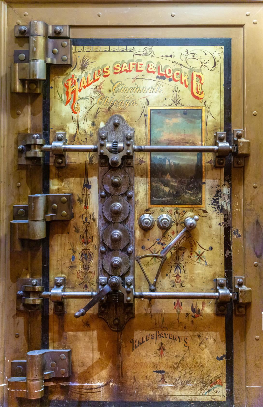A large old fashioned safe door - Hallsafe, CC BY-SA 4.0 <https://creativecommons.org/licenses/by-sa/4.0>, via Wikimedia Commons